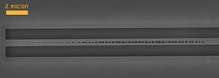 Photonic crystal cavity. The refractive index of a silicon waveguide is modulated by etching nano-scale holes. Thus, the emission of erbium dopants in the resonator can be dramatically enhanced.