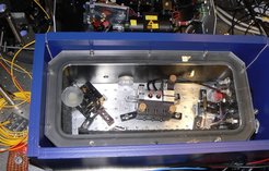 Figure 1: Extended Cavity Diode Laser System with intra-cavity electro-optic modulator.
