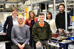 Nathalie Picqué and her current group in one of their laboratories. From left to right: Nathalie Picqué, Stephan Amann, Lauren Guillemot, Bingxin Xu, Yuki Sano, Lucas Deniel.