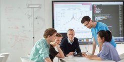"Inspiring young people to become excited about a field of research is a beautiful thing", says Immanuel Bloch, here discussing with his doctoral students.