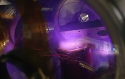 Thorium-229 target surrounded by oxygen plasma.