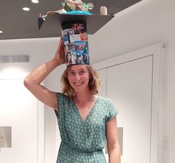 PhD Graduation: As per tradition, Caroline de Groot is presented with the handcrafted doctoral hat after her successful PhD defence.
